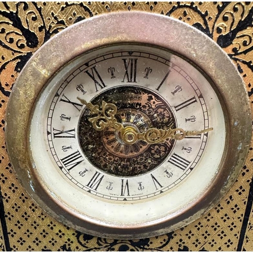 A Mercedes carriage clock, 22ct gold embossed marked Design Philipp