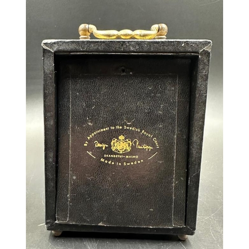 A Mercedes carriage clock, 22ct gold embossed marked Design Philipp