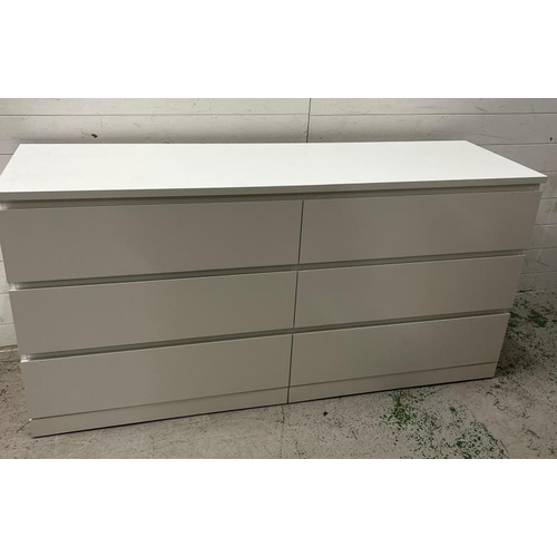 36 - An Ikea long white chest of drawers (H77cm W160cm D49cm)