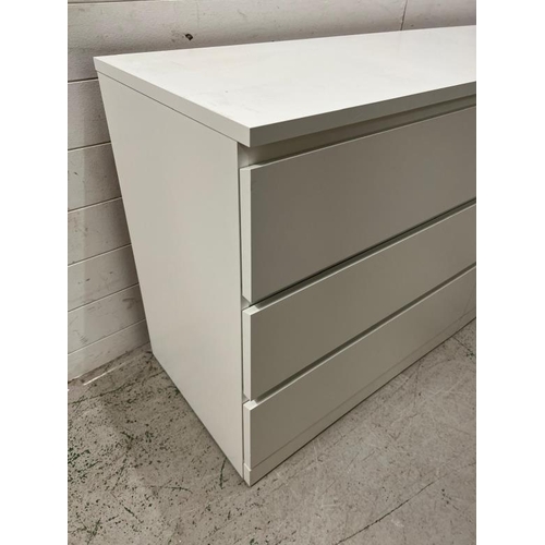 36 - An Ikea long white chest of drawers (H77cm W160cm D49cm)