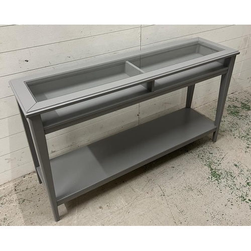 37 - An Ikea console table with glass top (H75cm W132cm D37cm)