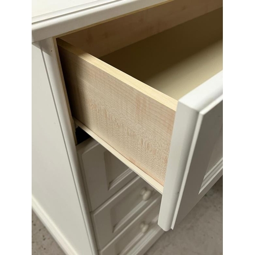 38 - A white chest of drawers (H97cm W106cm D51cm)