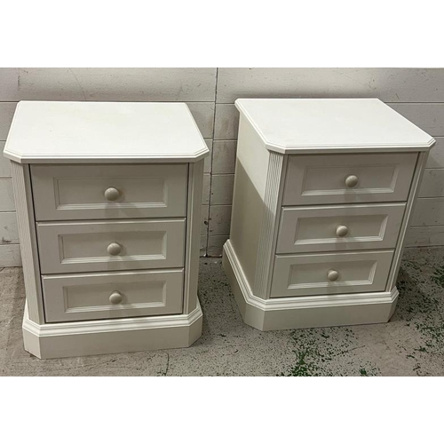 39 - A pair of white bedsides consisting of three drawers (H63cm W52cm D44cm)