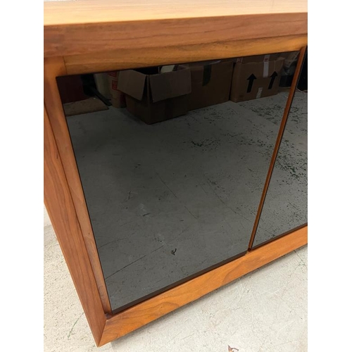 41 - A sideboard with three black glass panelled front (H80cm W152cm D45cm