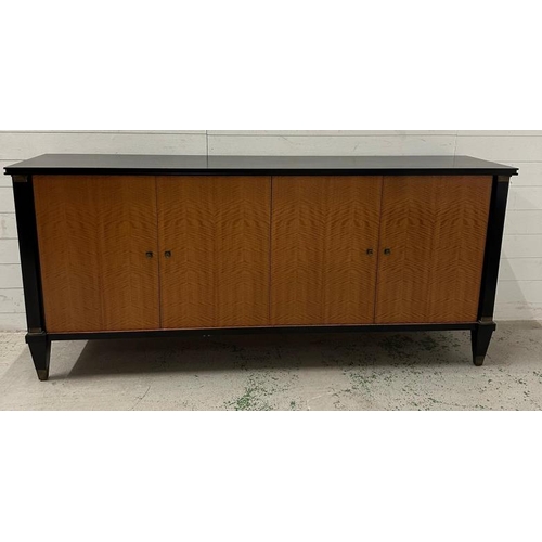 43 - A contemporary Art Deco style sideboard by Chilewich, with two cupboards opening to drawers and stor... 