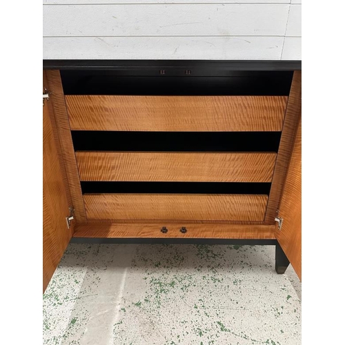 43 - A contemporary Art Deco style sideboard by Chilewich, with two cupboards opening to drawers and stor... 