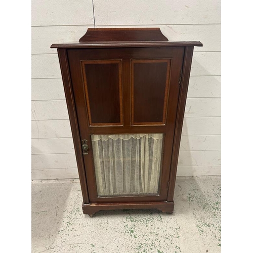 44 - An Edwardian mahogany pot cupboard with glazed door and galleried top (H92cm W55cm D31cm)