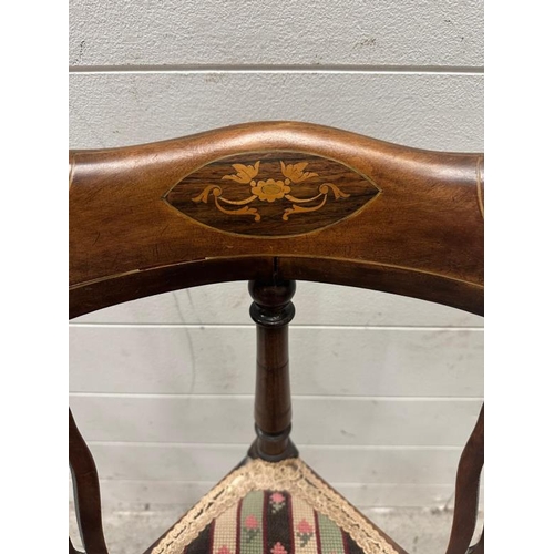 45 - An Edwardian inlaid corner chair upholstered in a floral pattern