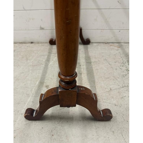 46 - A Mahogany towel rail with turned supports and stretcher on splayed legs