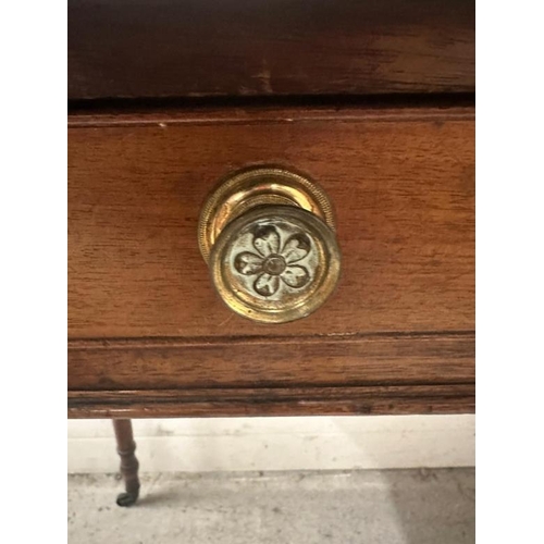 54 - A mahogany two drawer side table on turned legs and castors (H70cm W90cm D46cm)