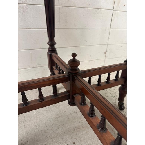 55 - An Edwardian style hexagonal occasional table on turned legs and castors (H75cm Dia76cm)