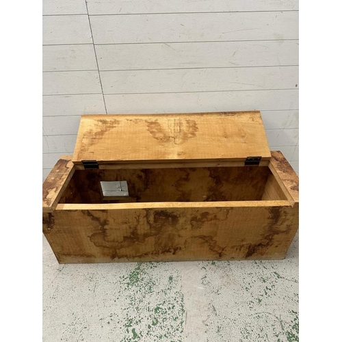 61 - A heavily patinated wooden storage box with hinged lid (H45cm W125cm D42cm)