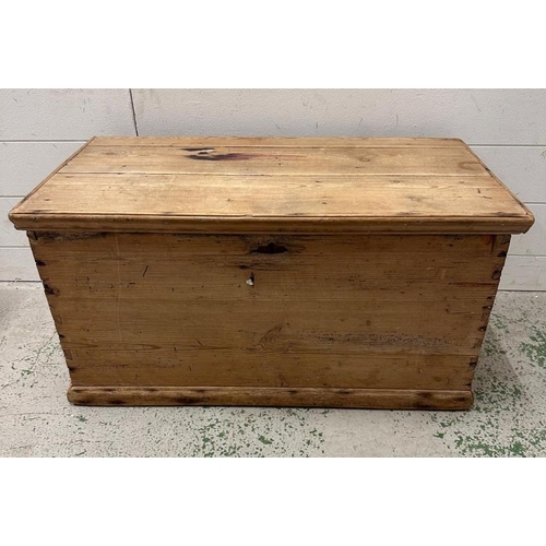 62 - A small pine storage box with hinged lid (H38cm W75cm D4ocm)