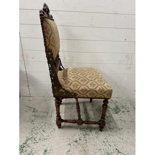 72 - A set of four oak French hall chairs with carved backs and turned legs and stretchers upholstered in... 