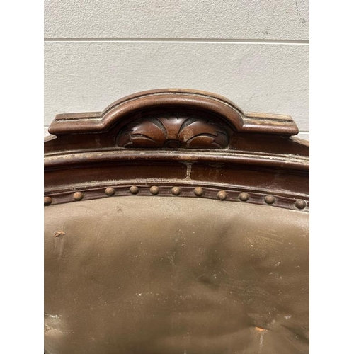 74 - An ebonised hall chair with cornicle finials, barley twist supports and mother of pearl inlay on cab... 