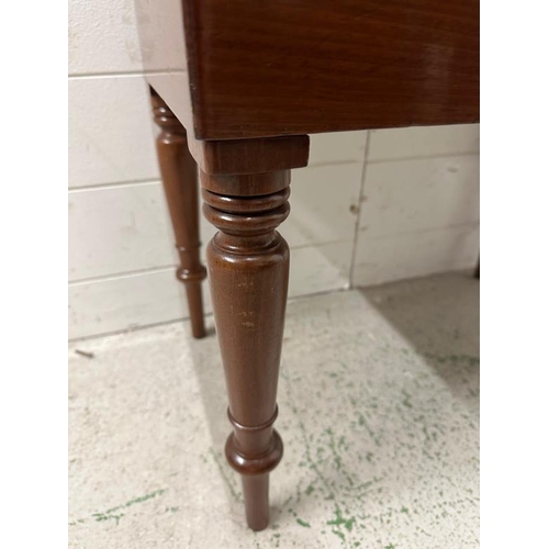 82 - An Edwardian mahogany babies bath with ceramic insert and turned legs