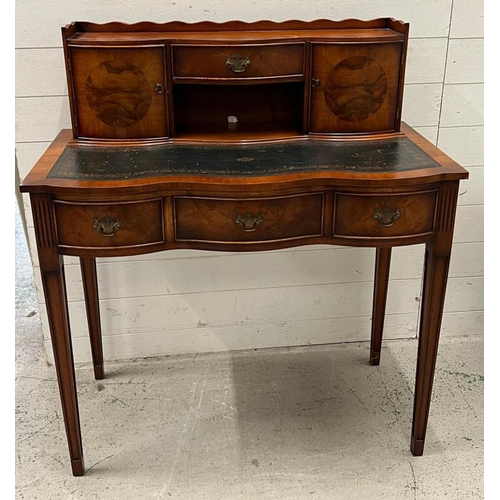 97 - Edwardian style serpentine writing desk (H109cm W96cm D51cm)