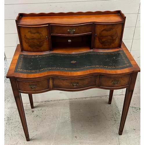 97 - Edwardian style serpentine writing desk (H109cm W96cm D51cm)