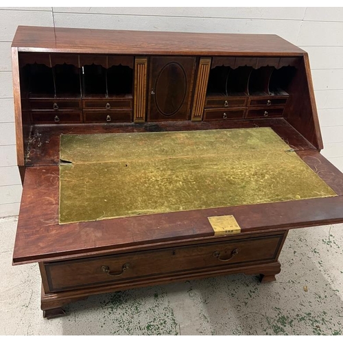 1 - A mahogany inlaid bureau opening to pigeon holes and drawers (H110cm W110cm D59cm)