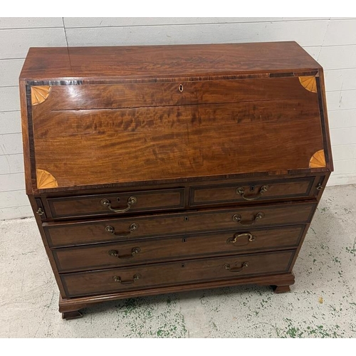 1 - A mahogany inlaid bureau opening to pigeon holes and drawers (H110cm W110cm D59cm)