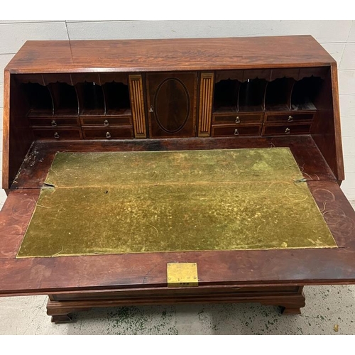 1 - A mahogany inlaid bureau opening to pigeon holes and drawers (H110cm W110cm D59cm)