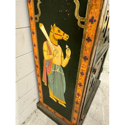 102 - An Indian folk art painted cupboard, the doors featuring elephants in traditional costume and the si... 