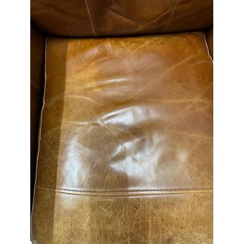 105 - A brown leather club arm chair