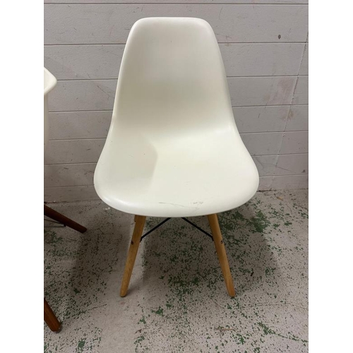 111 - Four vacuum form chairs in the manner of Herman Miller for Eames