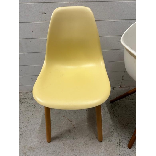 111 - Four vacuum form chairs in the manner of Herman Miller for Eames