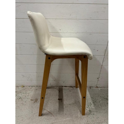 112 - A pair of John Lewis faux cream leather high backed bar stools