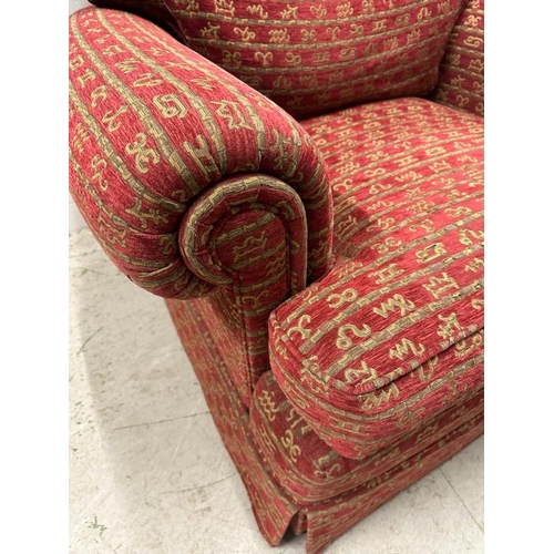 114 - A Duresta single armchair upholstered in a red and gold hieroglyphic pattern