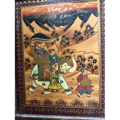 120 - A substantial Indian hardwood screen or room divider painted with rural Indian scenes featuring dign... 