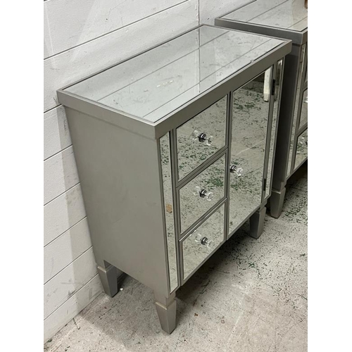 124 - A pair of mirrored side cabinets (H80cm W63cm D21cm)