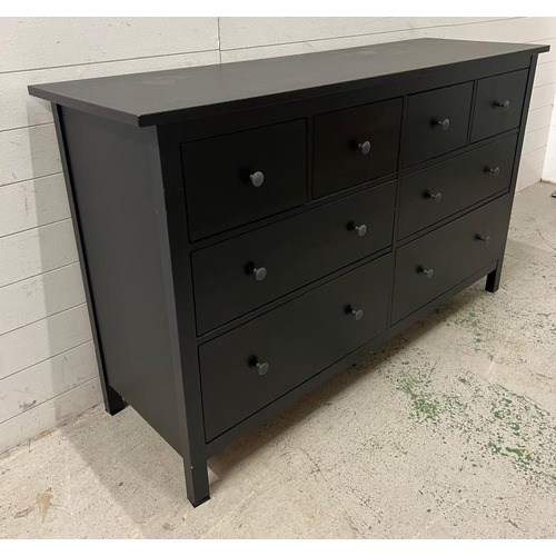 134 - An Ikea Hemnes chest of drawers in black (H96cm W160cm D50cm)