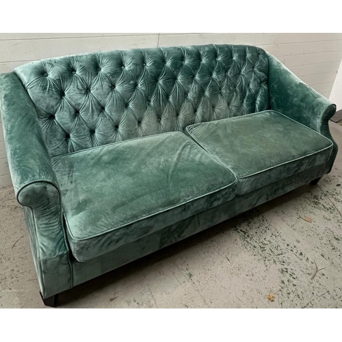 136 - Four seater sofa in plush teal velvet with button back (H95cm W207cm D80cm)