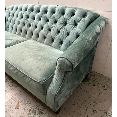 136 - Four seater sofa in plush teal velvet with button back (H95cm W207cm D80cm)