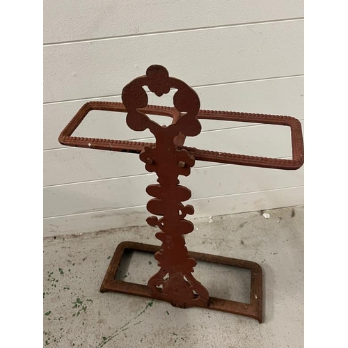 142 - A twin cast metal umbrella stand