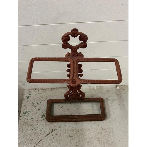 142 - A twin cast metal umbrella stand