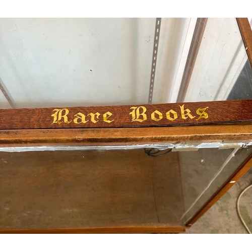 143 - A vintage haberdashery glass cabinet, classic shop counter with glass sliding doors and internal bra... 