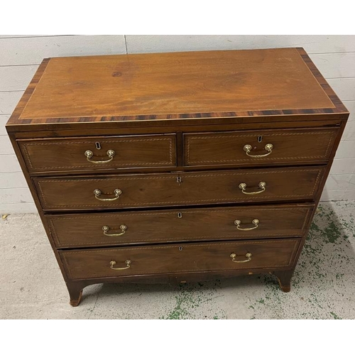 15 - An inlaid mahogany two over three chest of drawers with brass drop handles