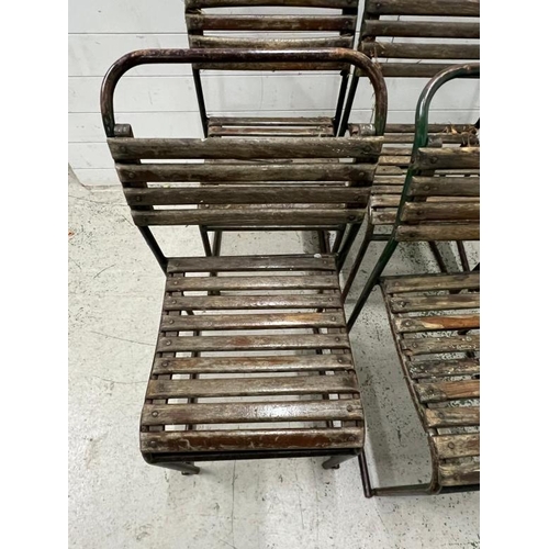 150 - A set of six PEL nesting chairs, tubular steel stacking frames with beech slats and distressed paint... 