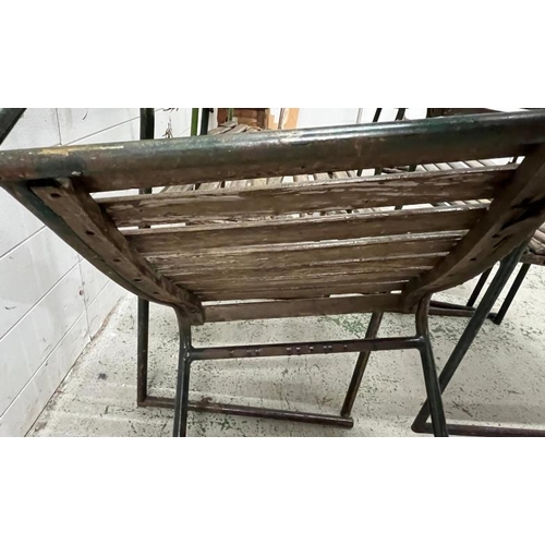 150 - A set of six PEL nesting chairs, tubular steel stacking frames with beech slats and distressed paint... 