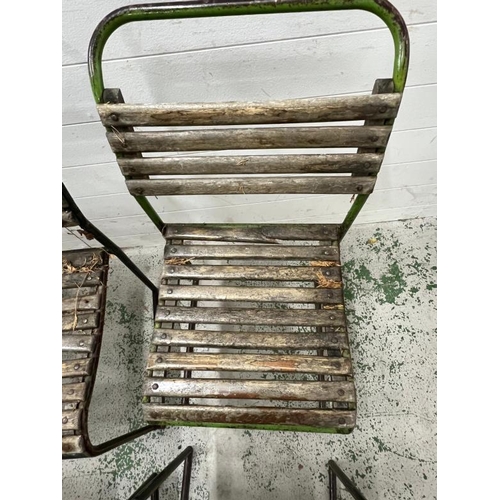 150 - A set of six PEL nesting chairs, tubular steel stacking frames with beech slats and distressed paint... 