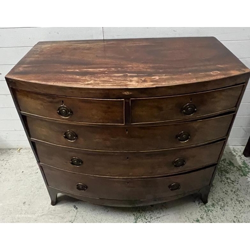 159 - A bow fronted chest of drawers. Height 105cm. 107x54