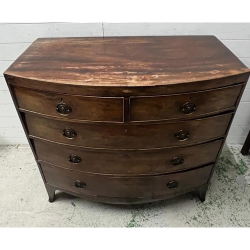 159 - A bow fronted chest of drawers. Height 105cm. 107x54