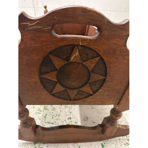 16 - A 19th Century mahogany rocking cradle with carved stars to ends