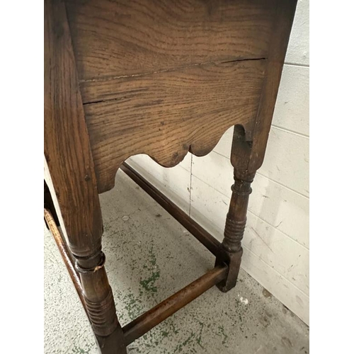 161 - An oak William and Mary style sideboard with two long drawers, brass handles and turned legs. Height... 