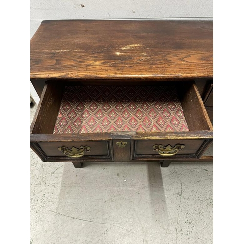 161 - An oak William and Mary style sideboard with two long drawers, brass handles and turned legs. Height... 