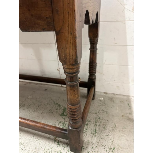 161 - An oak William and Mary style sideboard with two long drawers, brass handles and turned legs. Height... 