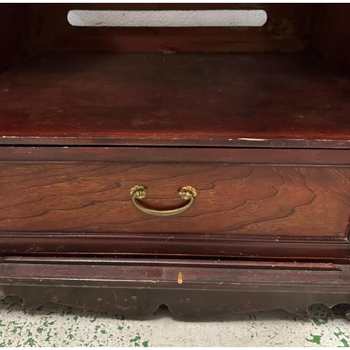 162 - A Korean style hardwood cabinet with brass hinges and fittings the cupboard opening to a single draw... 